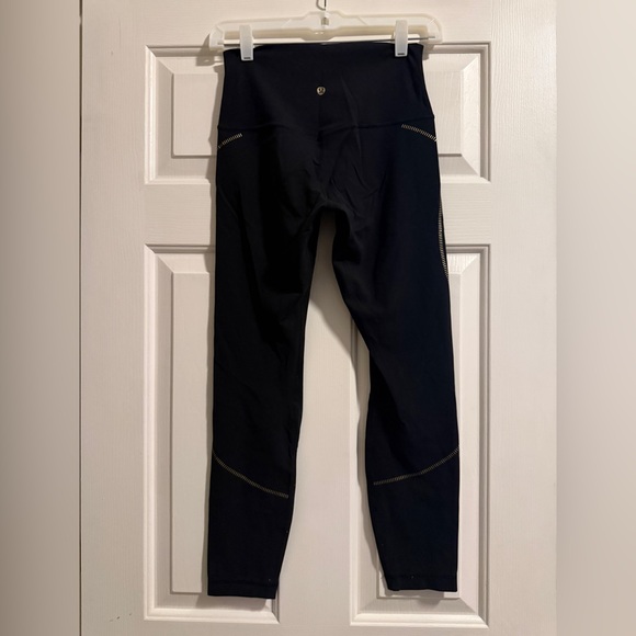 Lululemon Align black 25” leggings with gold detail - Picture 2 of 2